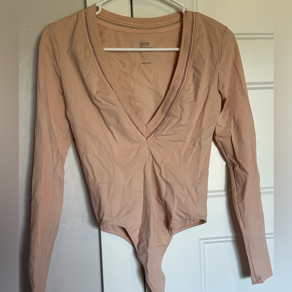 Good American blush pink body suit